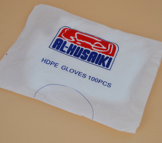 厂家直销防滑不沾手一次性食品级手套 透明全新料加厚PE手套