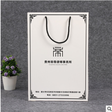 创意黑边白卡纸袋定做环保彩印广告购物袋定制通用礼品包装袋logo