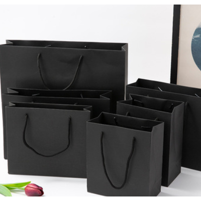 制定牛皮纸色黑卡手提袋时尚服装购物袋创意礼品包装袋子可印logo